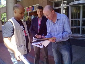 MTN and Vodacom representatives receiving R2K's memorandum. PIC: Busi Mtabane